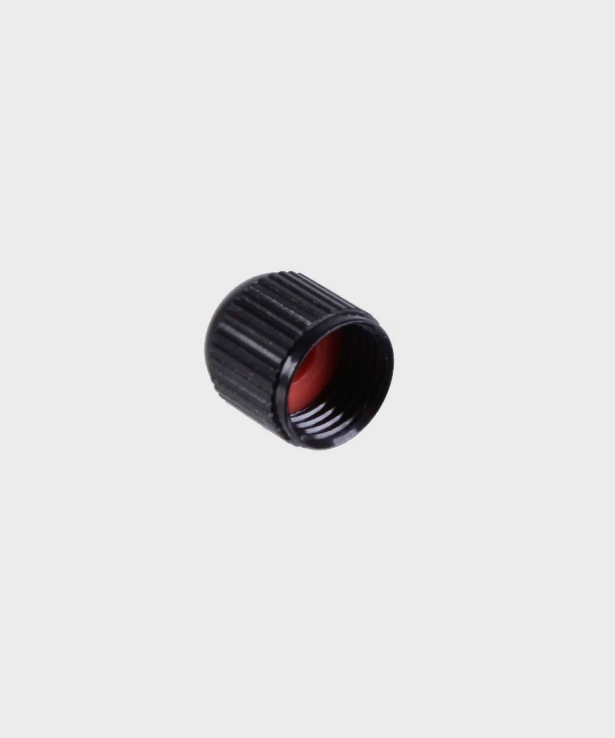 Black alloy Fox Shock rear air valve caps for suspension maintenance, shown in a pack of 50, designed for durable component protection.