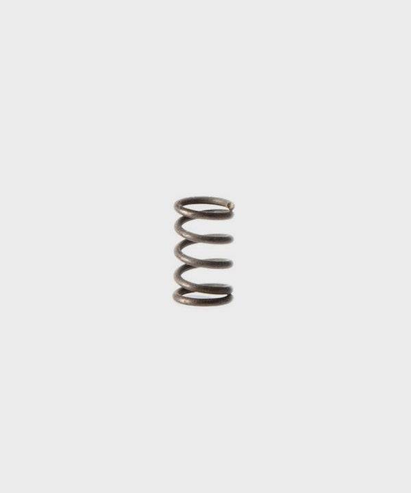 Fox left hand wound spring suspension component, 0.190 TLG x 0.120 OD, used for bicycle or motorcycle shock systems.