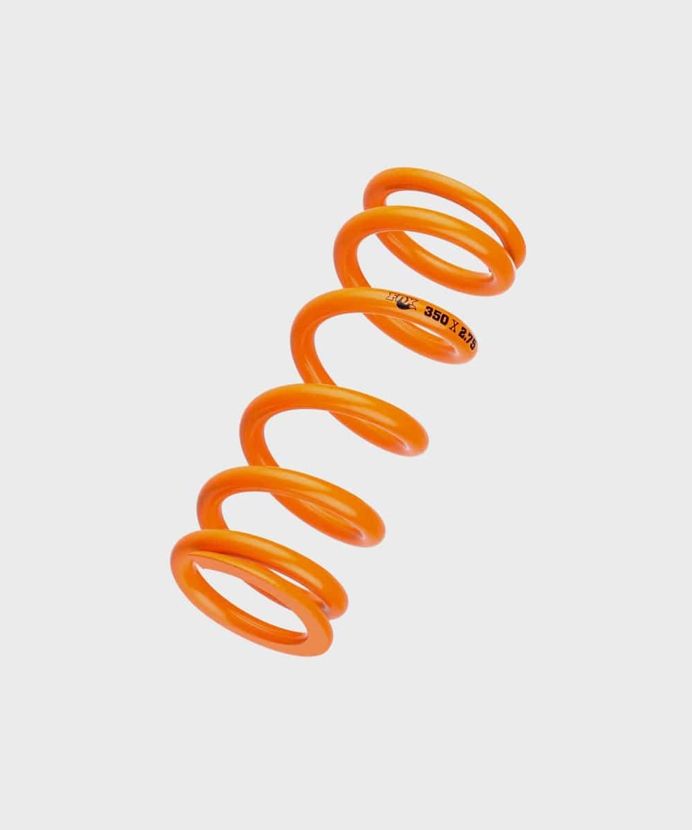 Fox SLS MTB rear shock spring with advanced surface treatment for durability, designed for mountain bike suspension components.