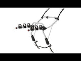 Thule 9103 ClipOn 3-bike rear carrier with secure frame holders mounted on hatchback vehicle for bike transport accessories.