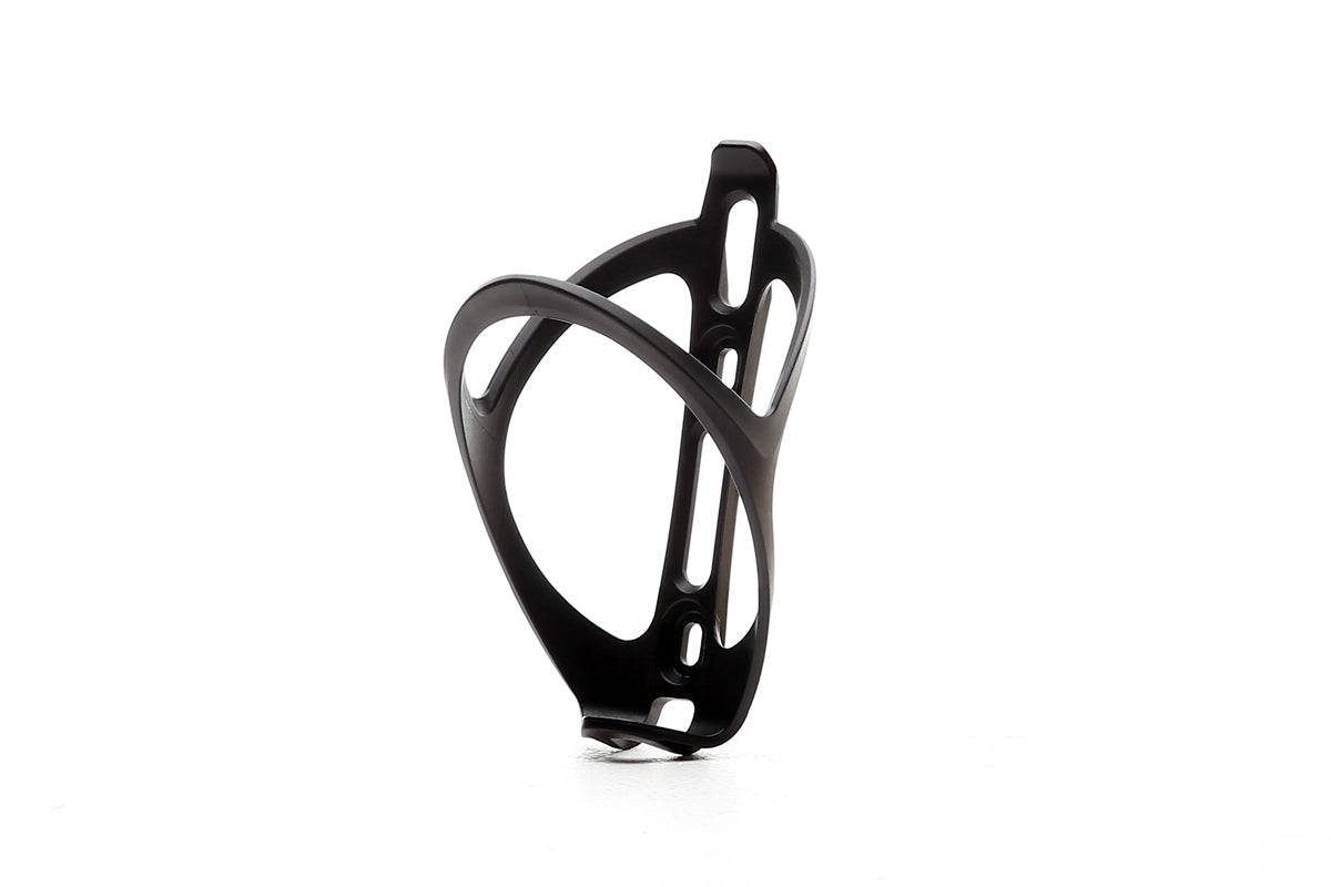 Durable matte black Fatty's Bottle Cage Resin bike water bottle holder attached to a bicycle frame.