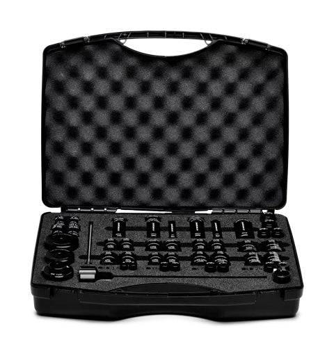 CeramicSpeed Wheel Bearing Press Tool Kit with quick release for bike hub maintenance, shown in a workshop setting.