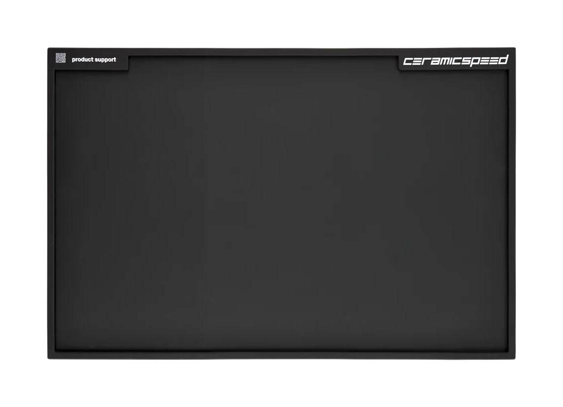 CeramicSpeed rubber workshop mat with raised edges, designed for small parts workbench and workshop organization.