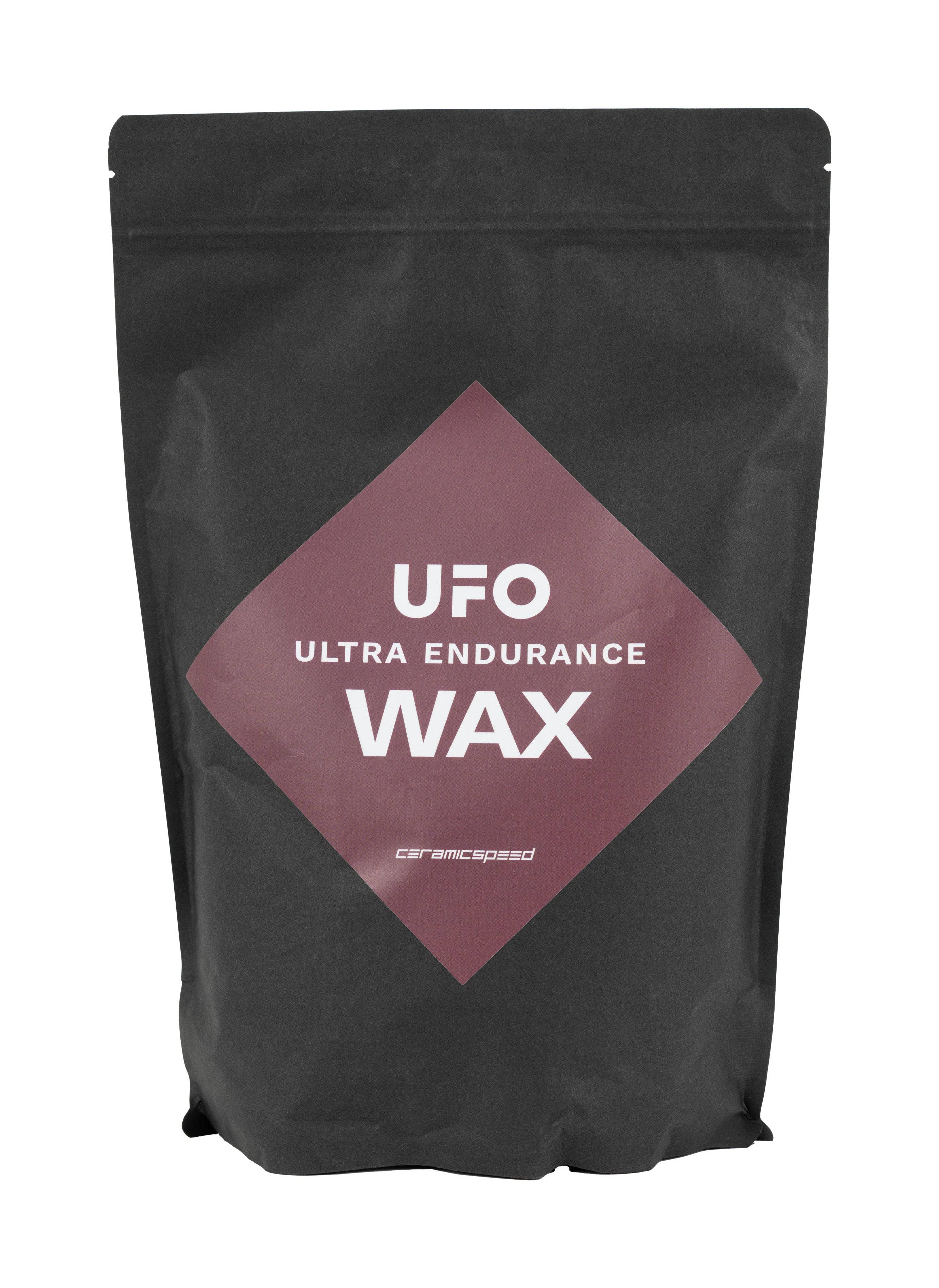 CeramicSpeed UFO Ultra Endurance wax bag with chain lubricant for gravel racing, shown in a workshop setting.