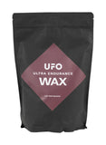 CeramicSpeed UFO Ultra Endurance wax bag with chain lubricant for gravel racing, shown in a workshop setting.
