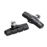 Avid Shorty Ultimate road bike brake pads and cartridge holder set for cycling components, with metal mounting hardware.