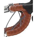 M Part Classic brown bar tape with adhesive and end plugs for road bike handlebars, providing grip and style.
