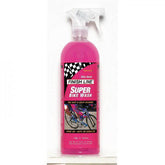 Finish Line Super Bike Wash eco-friendly bike cleaner in a workshop setting, showing a spray bottle and bike surface cleaning.