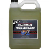 Finish Line EcoTech 2 biodegradable bike degreaser spray in a workshop setting, showcasing its eco-friendly cleaning capabilities.