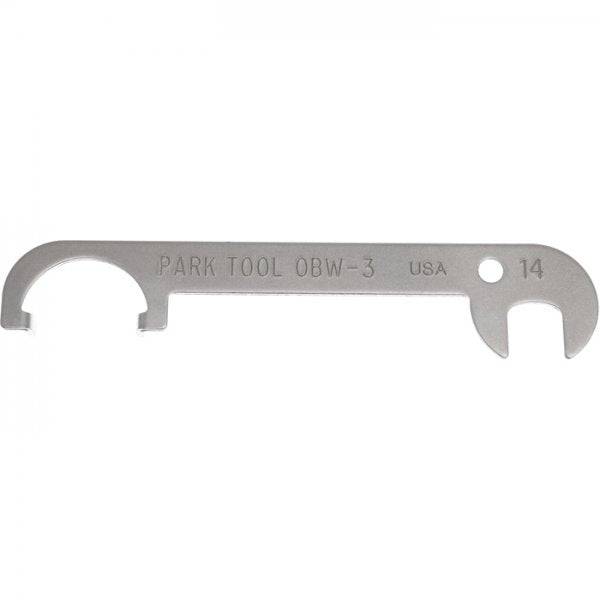 Park Tool OBW-3 offset brake centerer with 14mm wrench for caliper brakes, used in bike workshop maintenance.