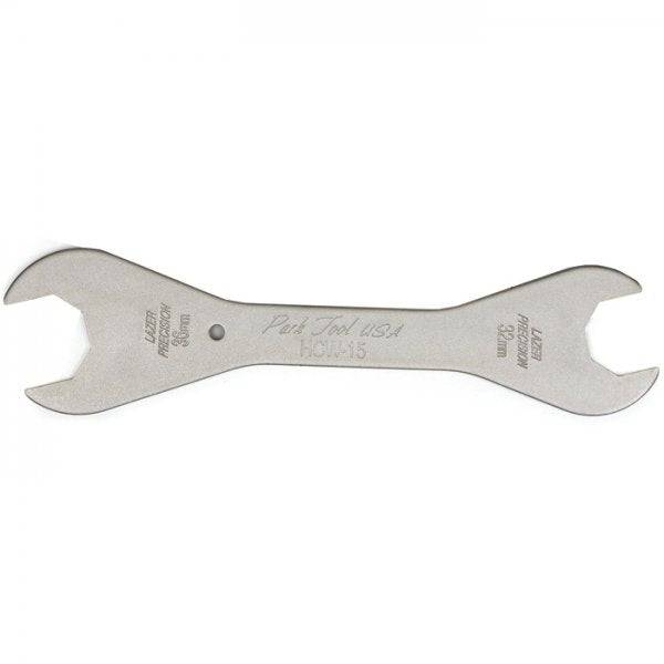 Park Tool HCW-15 headset wrench with 32mm and 36mm sizes for bicycle maintenance, shown in a workshop setting.