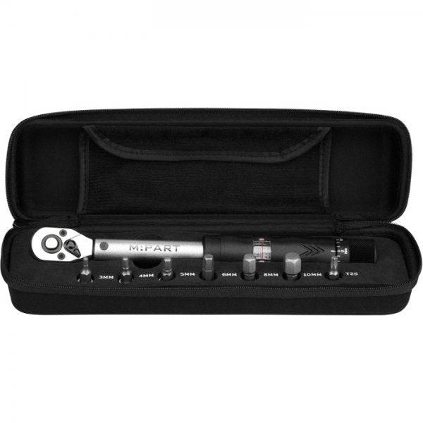 M Part torque wrench with adjustable 3-15 Nm torque and socket set, ideal for precise bike maintenance in a workshop setting.