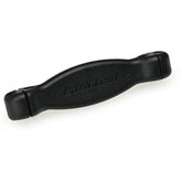 Park Tool BSH-4 bladed spoke holder used for precise wheel building and maintenance in workshop settings.