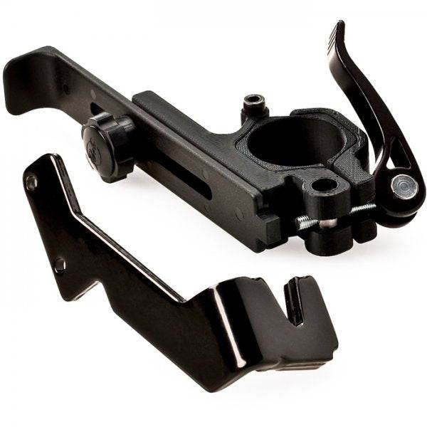 Park Tool TS-25 wheel truing stand attached to a repair workstand, used for bicycle wheel alignment and repair.