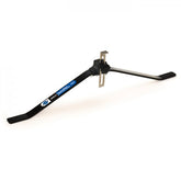 Park Tool WAG-5 portable wheel alignment gauge for 24-29 inch bike wheels, used in workshop for precise bike wheel alignment.