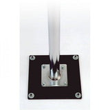Park Tool FP-2 floor mounting plate for PRS-2 and PRS-3 repair stands, shown attached to workshop floor for stability.
