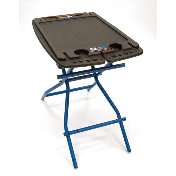 Park Tool PB-1 portable bike maintenance workbench with foldable design, ideal for workshop and bike repair tasks.