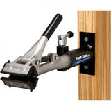 Park Tool PRS-4W-1 Deluxe wall-mount bike repair stand with 100-3C clamp, workshop bike repair station, sturdy and space-saving.
