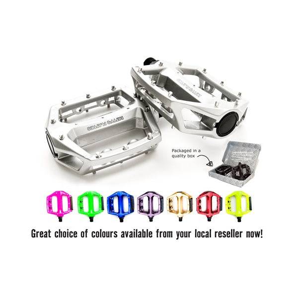 Fat Spanner Fattys Flatties Dobber silver alloy flat bike pedals with pins, designed for durable and secure riding.