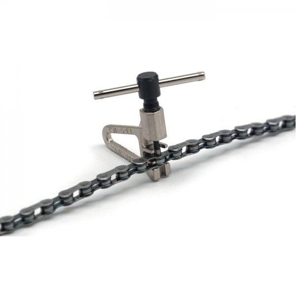 Park Tool CT-5 Mini Chain Brute bike chain tool for 5-12 speed bicycle chains, shown on a workshop workbench.