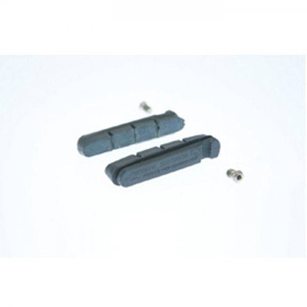 Shimano R55C3 carbon rim brake pads for Dura-Ace road bike brake systems, showing the black pad design and metal backing.