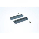 Shimano R55C3 carbon rim brake pads for Dura-Ace road bike brake systems, showing the black pad design and metal backing.