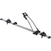 Thule 532 Freeride locking upright roof bike carrier attached to car roof with bike secured for transport.