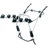 Thule 9103 ClipOn 3-bike rear carrier with secure frame holders attached to a hatchback vehicle.