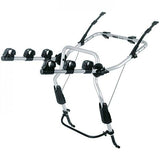 Thule 9103 ClipOn 3-bike rear carrier with secure frame holders attached to a hatchback vehicle.