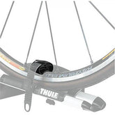 Thule wheel strap adaptors for cycle carriers securing low profile bike rims with durable, protective accessories.