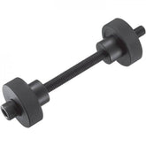 Shimano TL-BB12 press-fit bottom bracket installation tool for workshop use, in a workshop setting with tools and components