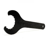 Shimano Workshop HollowTech II bottom bracket spanner tool for bike maintenance, showing a metal tool on a workshop background.