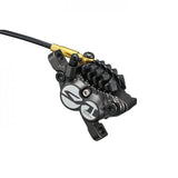 Shimano Saint M820 4-piston disc brake caliper for front or rear post mount mountain bike, durable brake component.