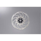 Shimano Deore SM-RT64 centre-lock disc brake rotor for cycling, showing the silver rotor with black mounting hub.