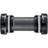 Shimano Ultegra BB-R60 bottom bracket for road bikes, featuring HollowTech II technology, installed in a bicycle crankset.