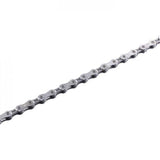 Shimano Ultegra CN-6701 HG 10-speed bike chain with 116 links, showing the gold and silver metal links and directional design.