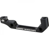 Shimano M985 disc brake adapter for 180mm rotors, post mount, bicycle component, used for mounting Shimano disc brakes.
