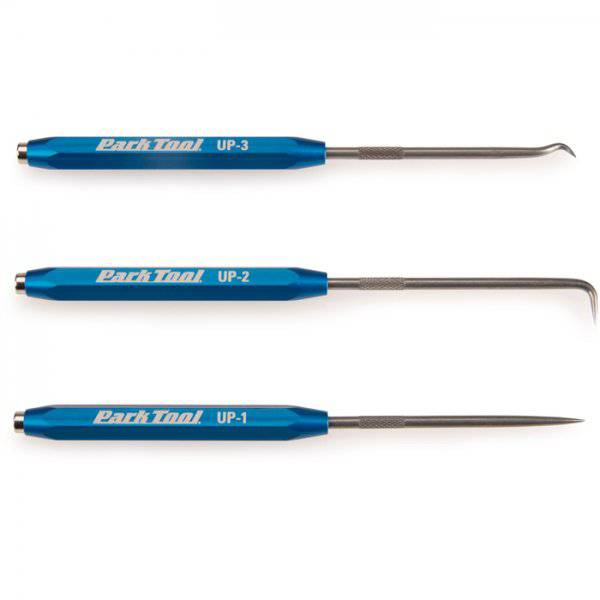 Park Tool UP-SET utility pick set with replaceable precision picks for bike maintenance, shown in a workshop setting.