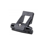 Topeak Fixer F25 black bike saddle accessory mount attached to a bike, lightweight and secure for carrying accessories.