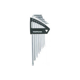 Topeak Duo Torx wrench set with 8 black and silver tools for bike workshop use, displayed in a workshop setting