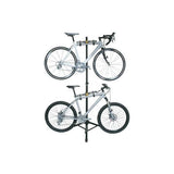 Topeak Two Up black bike stand for portable 4-bike storage and repair, with a sturdy metal frame and adjustable support arms.
