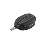 Topeak Dynapack DX black expandable bike seatpost bag with helmet storage, reflective safety features, and secure attachment straps.
