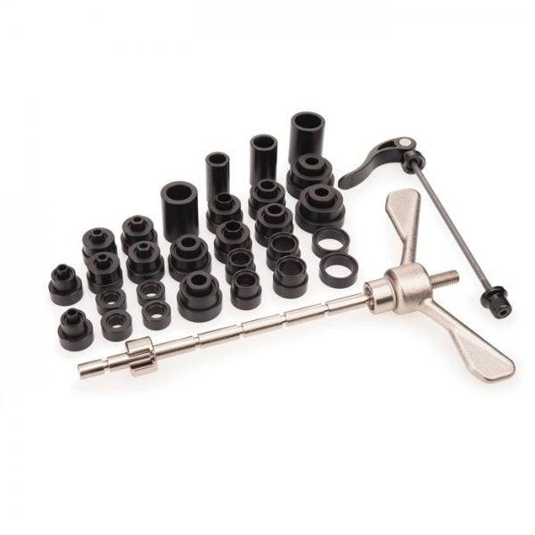Park Tool HBP-1 hub bearing press for cartridge bearing bicycle hubs, used in workshop for precise bearing installation.