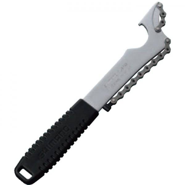 Shimano TL-SR23 sprocket remover tool for 3/32 inch 7-11 speed bike sprockets, shown in a workshop setting.