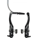 Shimano Alivio BR-T4000 V-brakes with S65T shoes for reliable stopping in wet weather, mounted on a bicycle wheel.