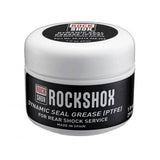 SRAM RockShox Dynamic Seal Grease with PTFE for rear shock service and maintenance in a workshop setting.