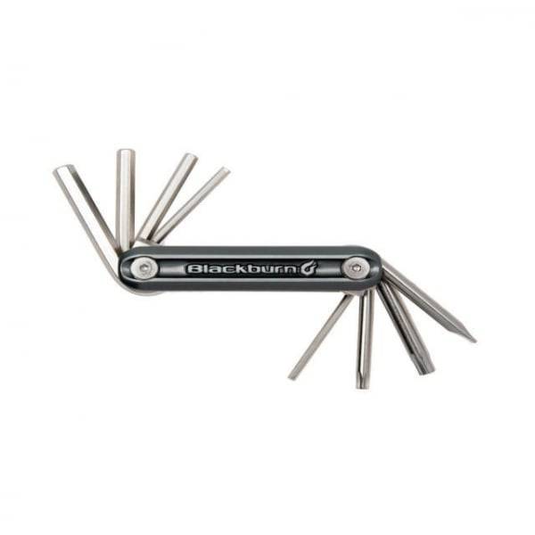 Blackburn Grid 8 Multitool for bikes, compact workshop tool with various repair tools and lifetime guarantee, shown on a workbench.