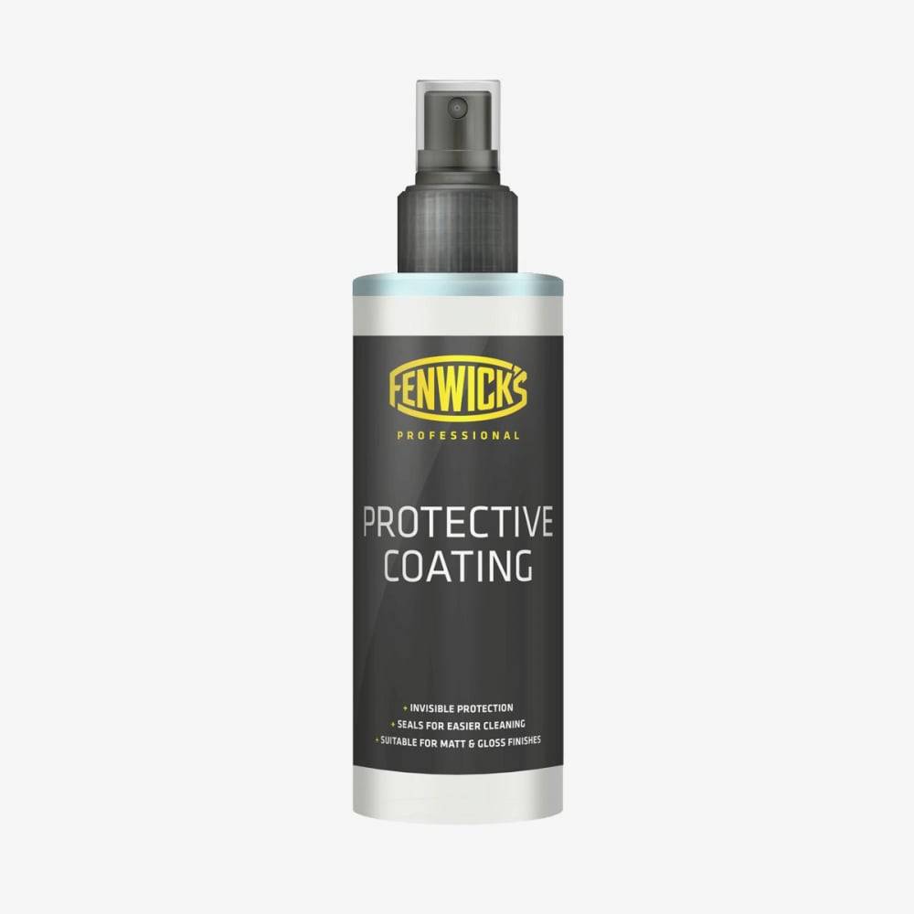Fenwick's Professional Protective Coating 100ml matte bike finish sealant in a workshop setting, ready for application.