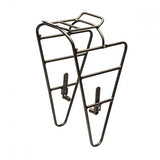 Blackburn Outpost Front Bikepacking Rack with removable top shelf mounted on a bike, made of titanium for durability and lightweight support.