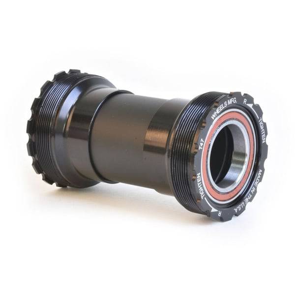 Wheels Manufacturing T47 inboard angular contact bearings for 24/22mm crank bottom bracket, shown installed in bike component.
